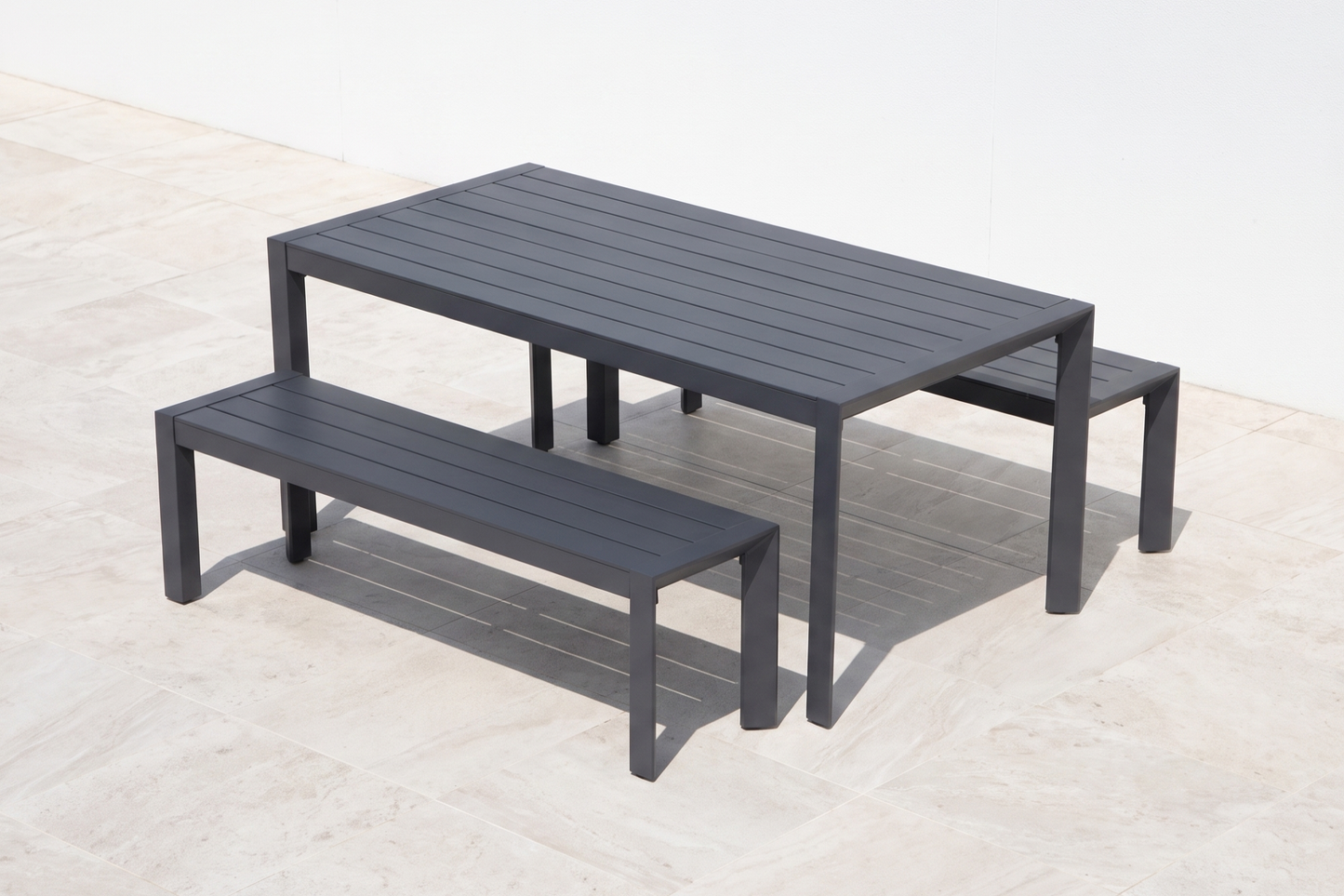 ABETE III 6-Seater Outdoor Dining Setting on a light porcelain paved terrace