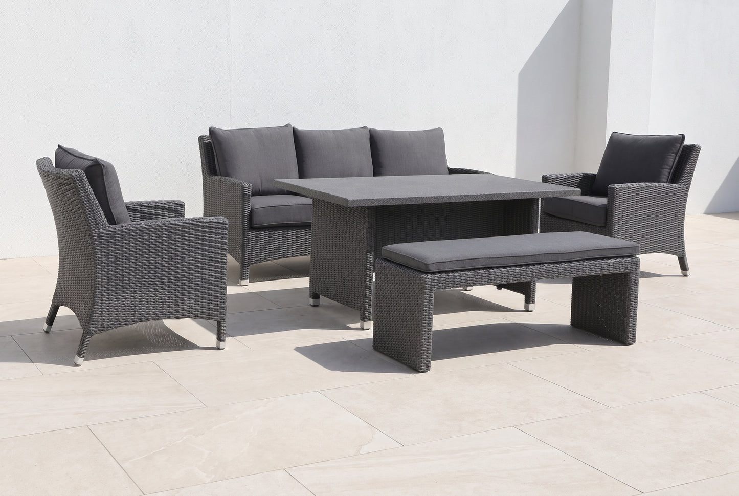 ALTHEA V 7-Seater Outdoor Modular Dining Setting on a light porcelain paved terrace