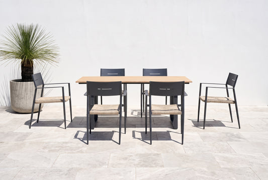 ARALIA VII 6-Seater Outdoor Dining Setting on a light porcelain paved terrace