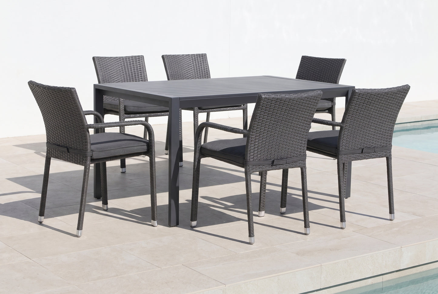 CARPINO VII 6-Seater Outdoor Dining Setting beside a pool on an alfresco terrace