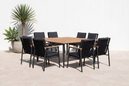 DATURA IX 8-Seater Outdoor Dining Setting on a light porcelain paved terrace