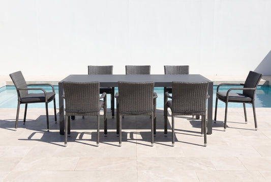 FICO IX 8-Seater Outdoor Dining Setting beside a pool on an alfresco terrace