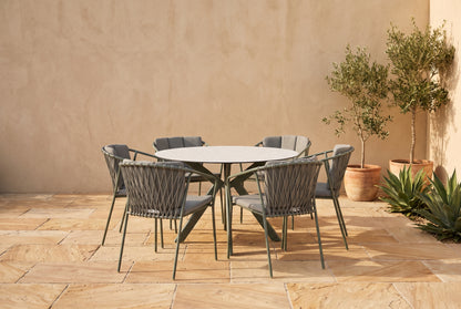 FRAGMA VII 6-Seater Outdoor Round Dining Setting in Pine Green styled on a Mediterranean-inspired Australian terrace