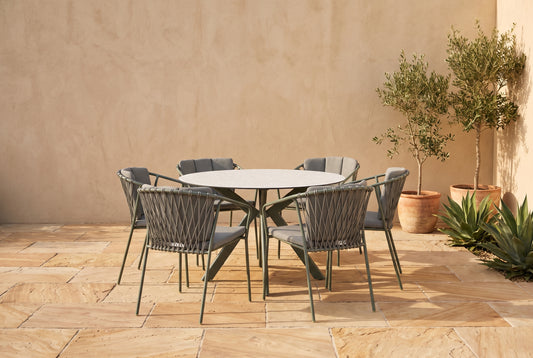 FRAGMA VII 6-Seater Outdoor Round Dining Setting in Pine Green styled on a Mediterranean-inspired Australian terrace