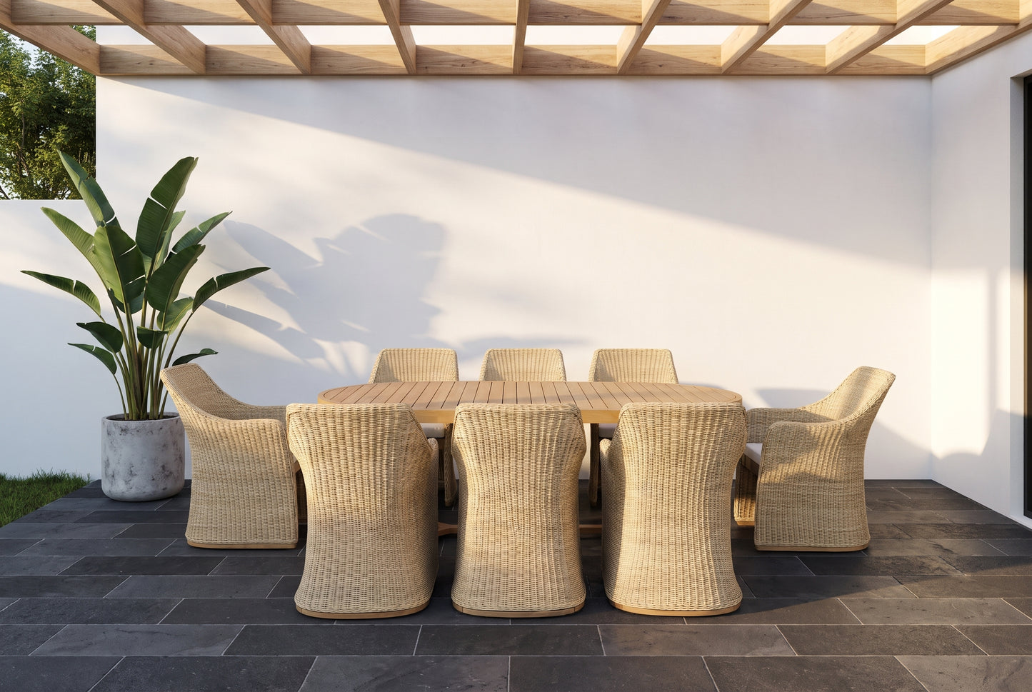 LANTANA IX 8-Seater Outdoor Dining Setting on a dark charcoal basalt stone paved alfresco terrace