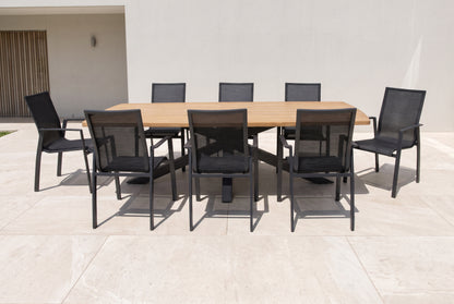MAHONIA IX 8-Seater Outdoor Dining Setting on a light porcelain paved terrace