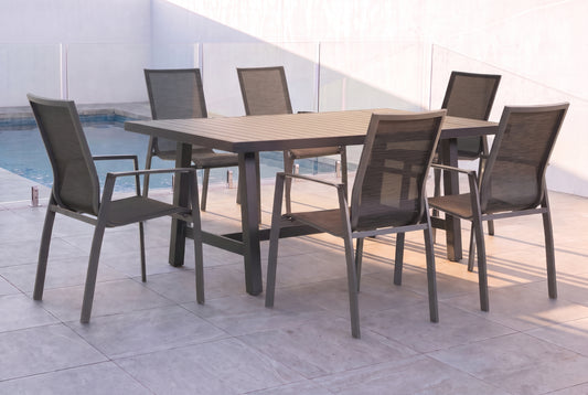 MALVA VII 6-Seater Outdoor Dining Setting beside a pool on an alfresco terrace