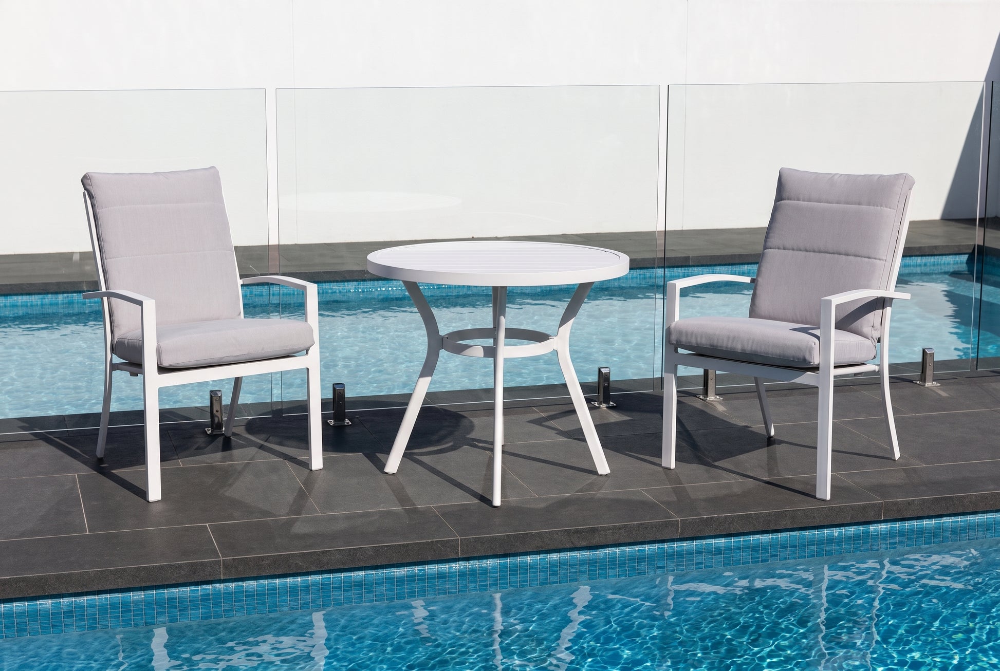 MELO III 2-Seater Outdoor Bistro Setting beside a pool