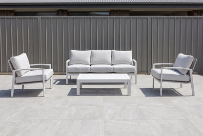 PESCO IV 5-Seater Outdoor Lounge Setting in White on a light porcelain paved terrace
