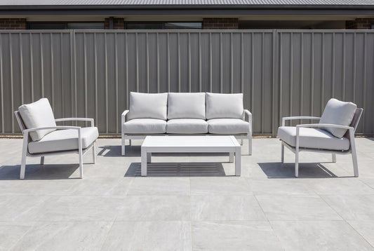 PESCO IV 5-Seater Outdoor Lounge Setting in White on a light porcelain paved terrace