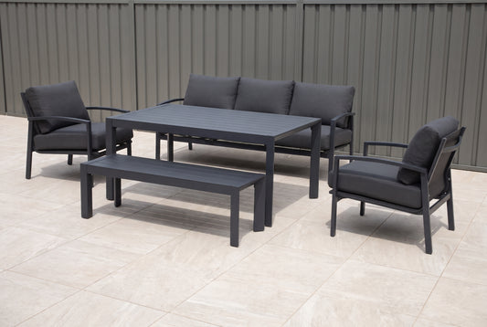 PESCO V 8-Seater Outdoor Low Dining Setting on a light porcelain paved terrace