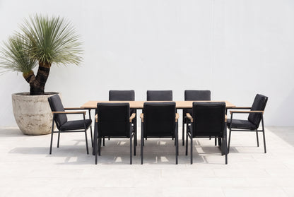 SUSANO IX 8-Seater Outdoor Dining Setting in Black on a light porcelain paved terrace