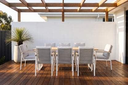 SUSANO IX 8-Seater Outdoor Dining Setting in White on a timber deck