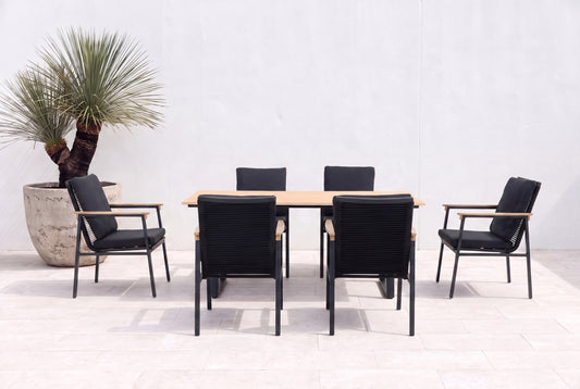 SUSANO VII 6-Seater Outdoor Dining Setting in Black on a light porcelain paved terrace