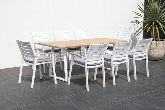 TIARELLO IX 8-Seater Outdoor Dining Setting on a dark charcoal porcelain paved terrace