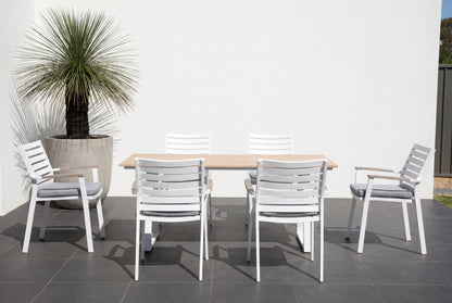 TIARELLO VII 6-Seater Outdoor Dining Setting on a dark charcoal porcelain paved terrace